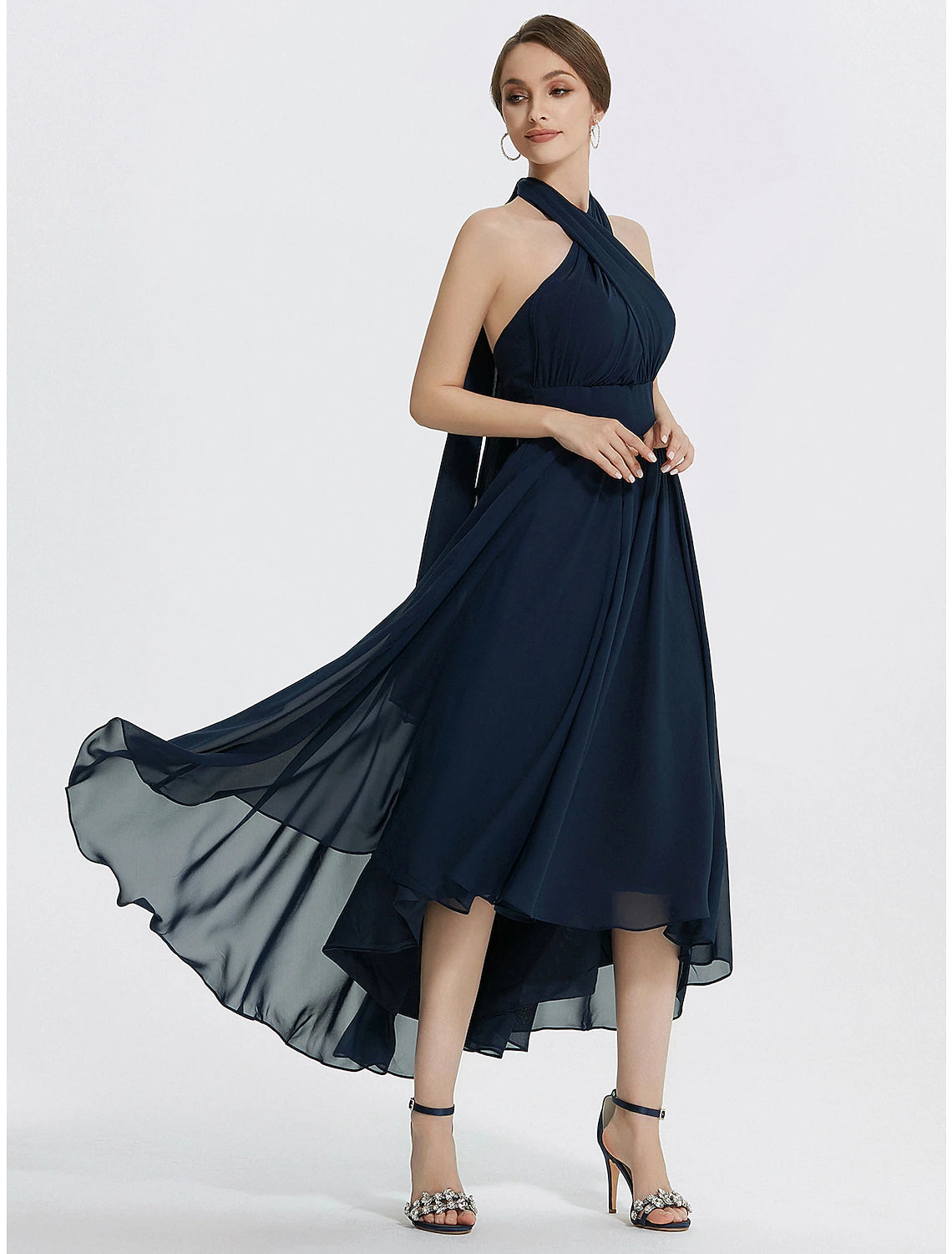 Full length view of the tea-length cocktail dress.