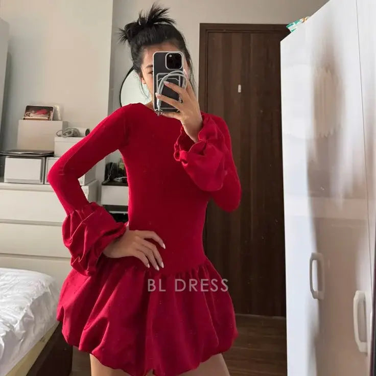 Elegant red A-line formal dress with long sleeves and crew neck.