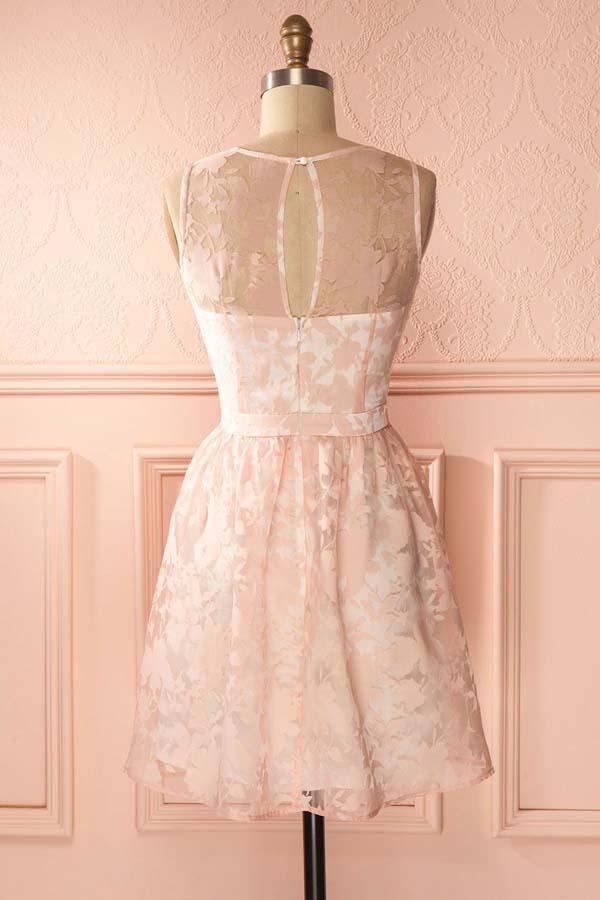 Back view of A-Line short lace homecoming dress showing open back design.