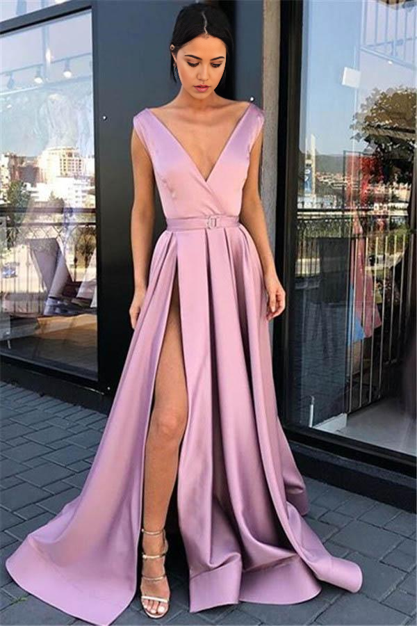 Model wearing an elegant A-line deep V-neck pink prom evening gown with a high split.
