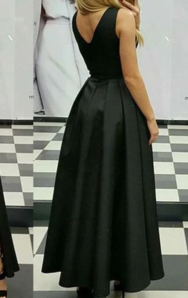 Satin high-low homecoming dress with deep V-neckline.