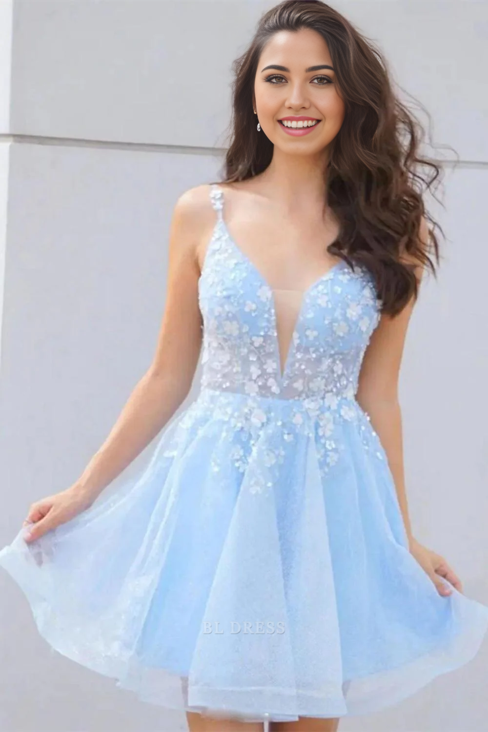 Back view of A-Line formal gown with spaghetti straps.