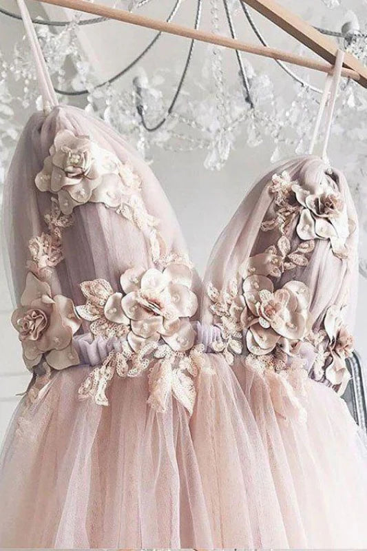 Back view of the A-line tulle floral prom dress with delicate spaghetti straps.
