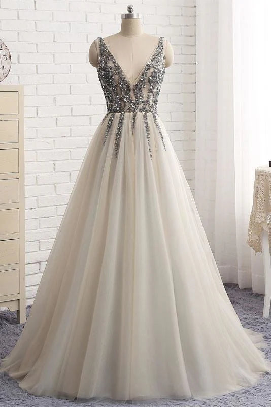 Elegant deep V-neck tulle sequin prom dress.