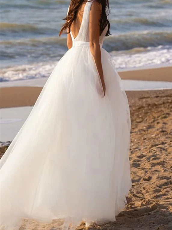 Side view of the A-Line deep V-neck tulle wedding dress.