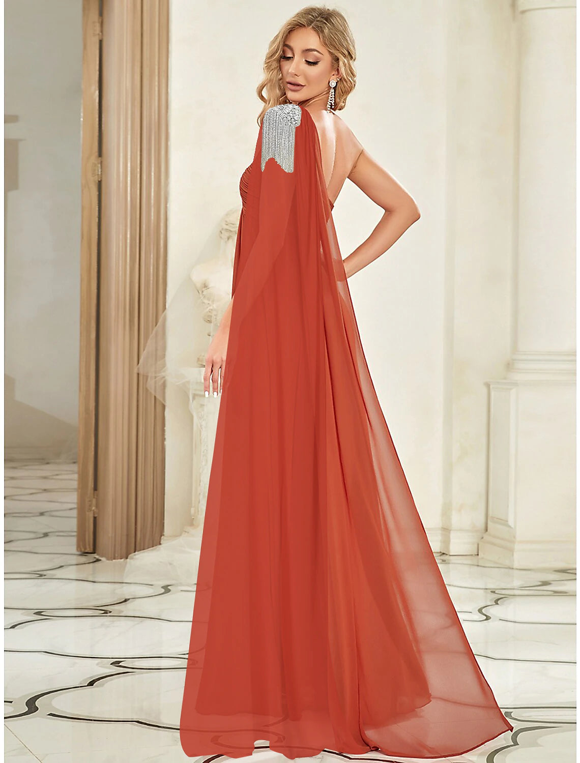 Back view of the flowing A-Line Empire one-shoulder evening gown.