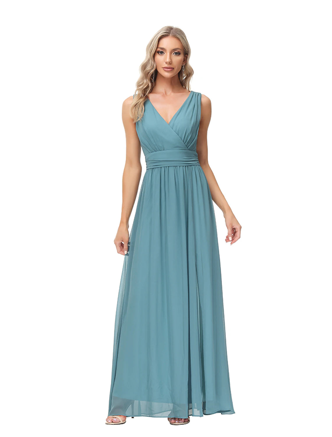 Woman wearing an elegant A-line chiffon evening gown with a V-neck and floor-length skirt.