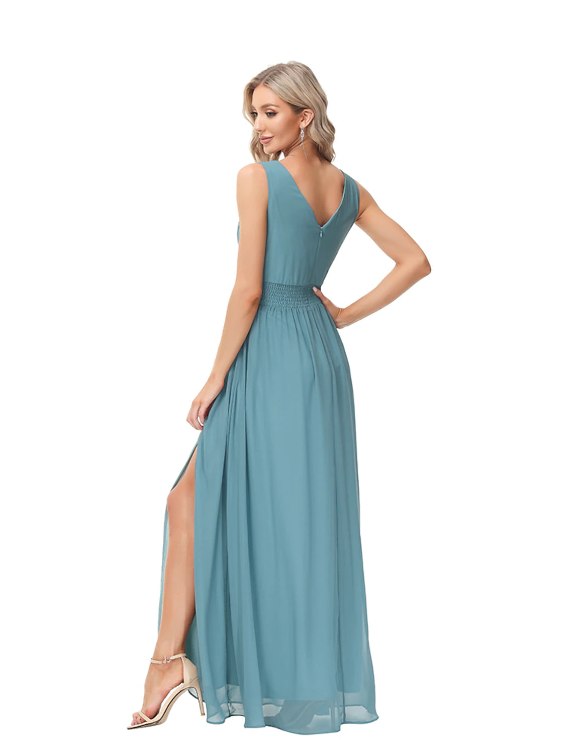 Close-up of the flowing chiffon fabric and V-neck detail of the evening gown.