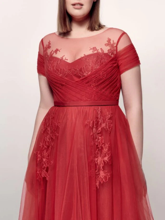 Elegant A-line evening dress with short sleeves.
