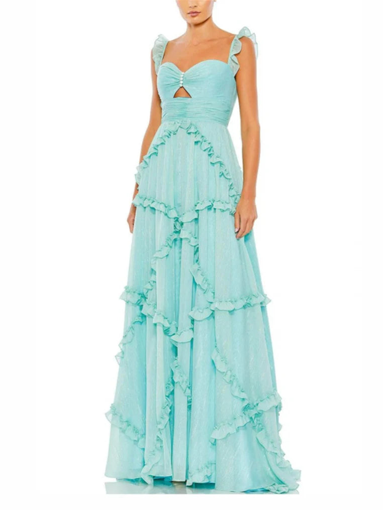 Woman wearing an elegant A-line floor-length evening dress with spaghetti straps.