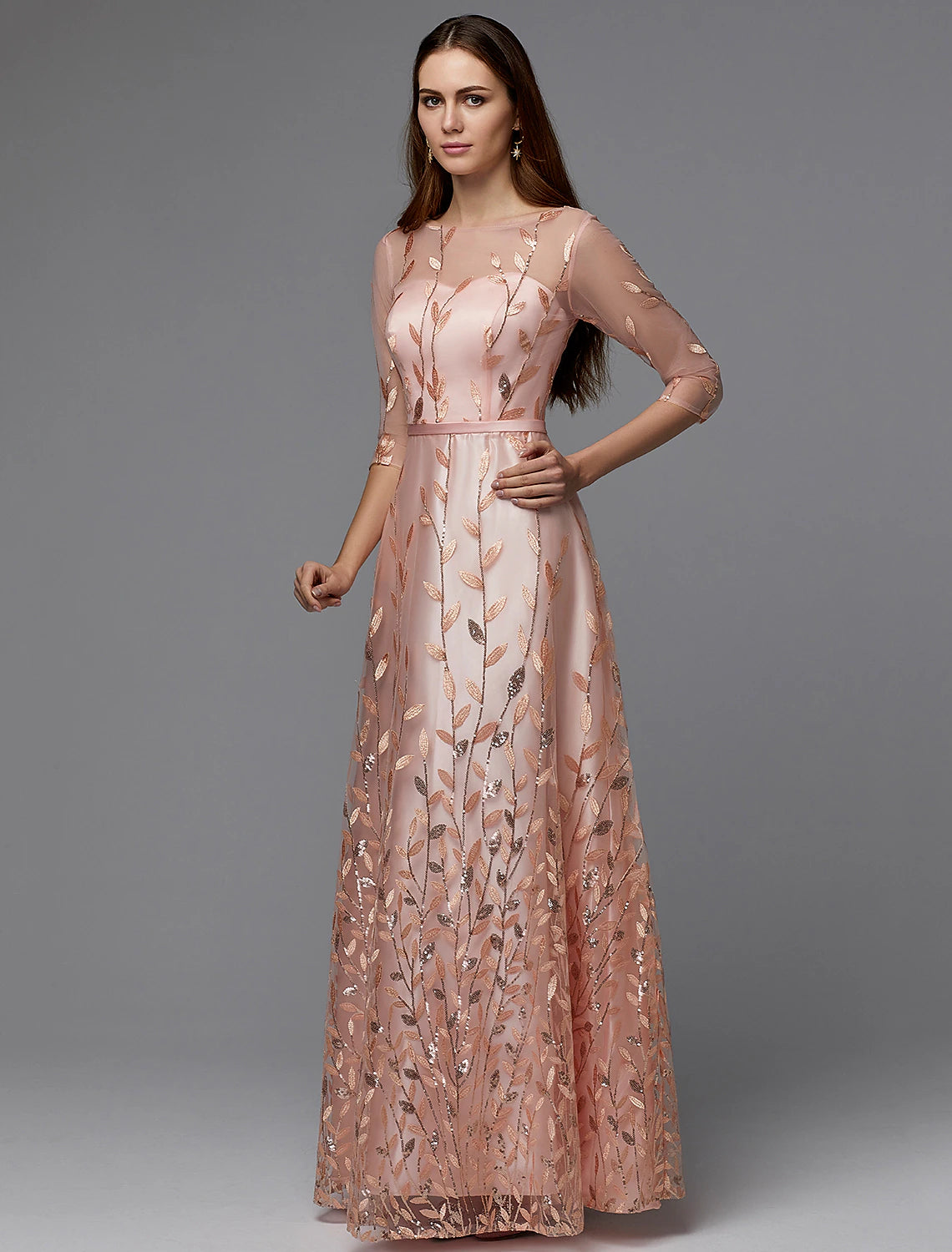 Side view of the floor length A-Line dress with delicate floral appliques.