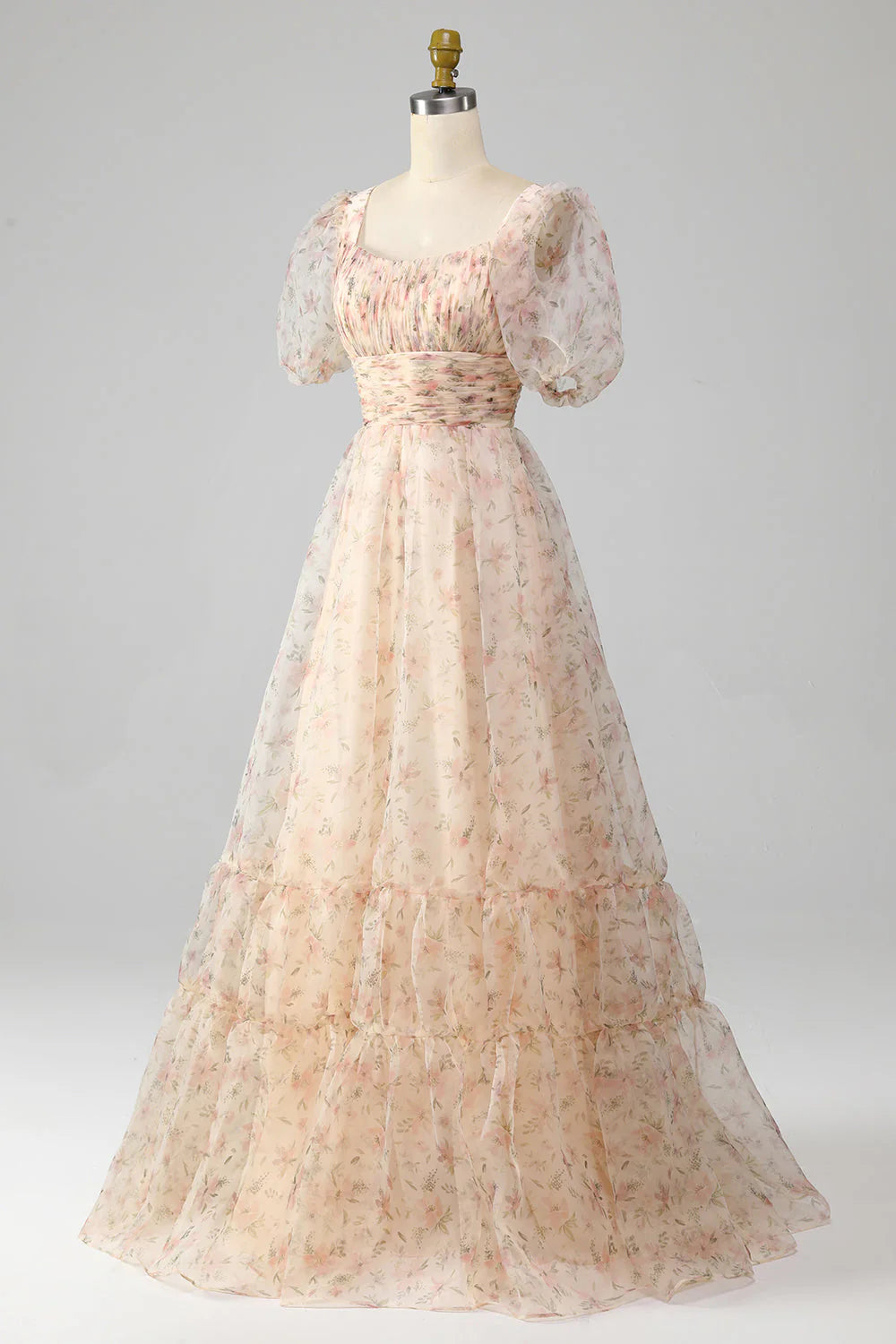 Close-up of the floral pattern and pleated tiers on the A-Line prom dress.