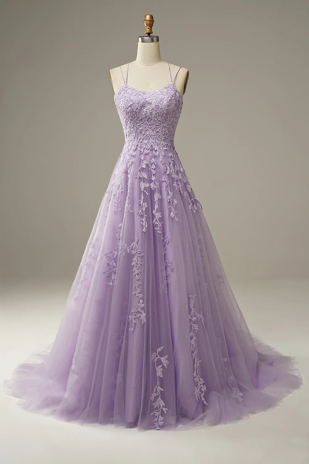 Front view of a purple A-Line floral prom dress with spaghetti straps.