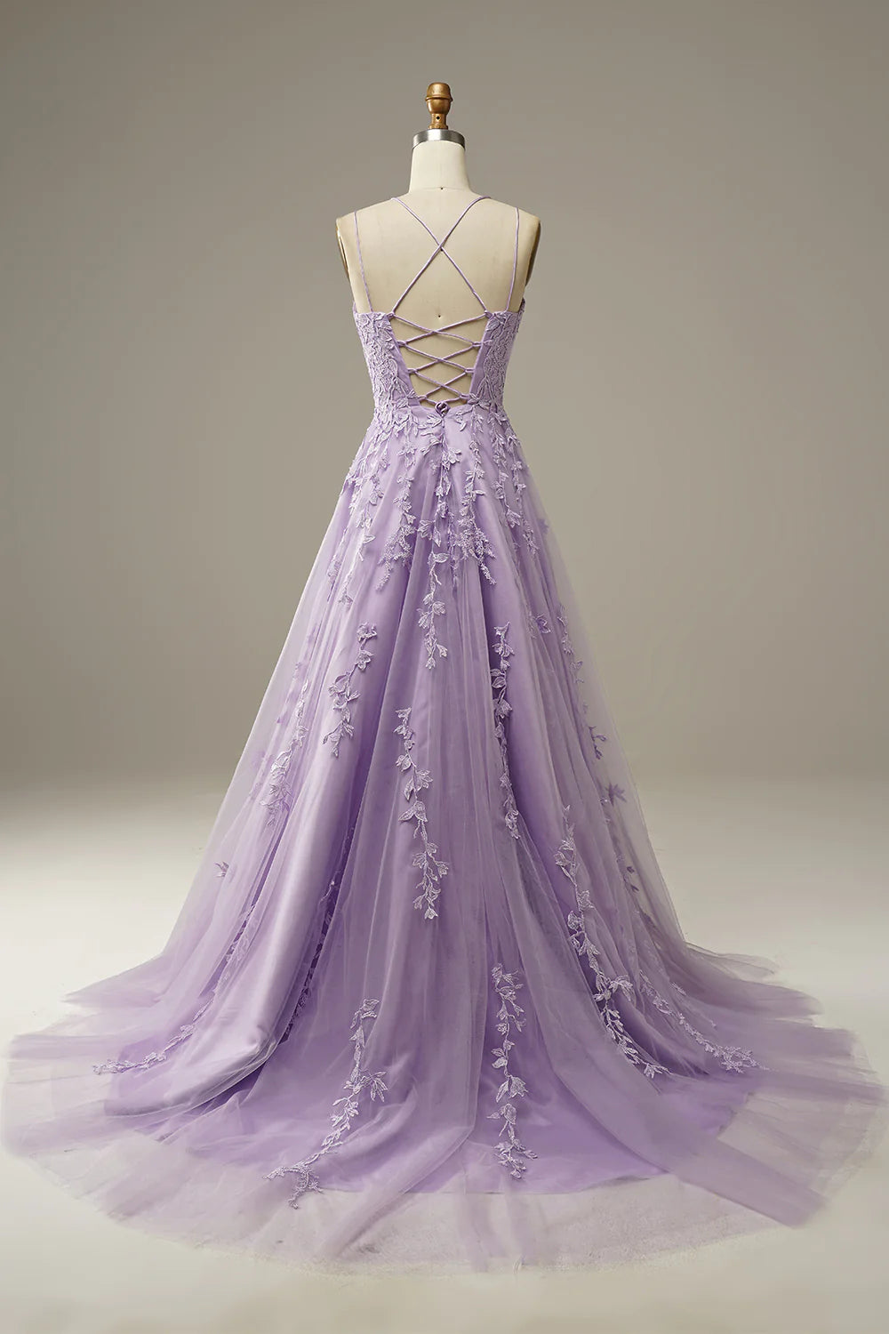 Back view of a purple A-Line prom dress with chapel train.