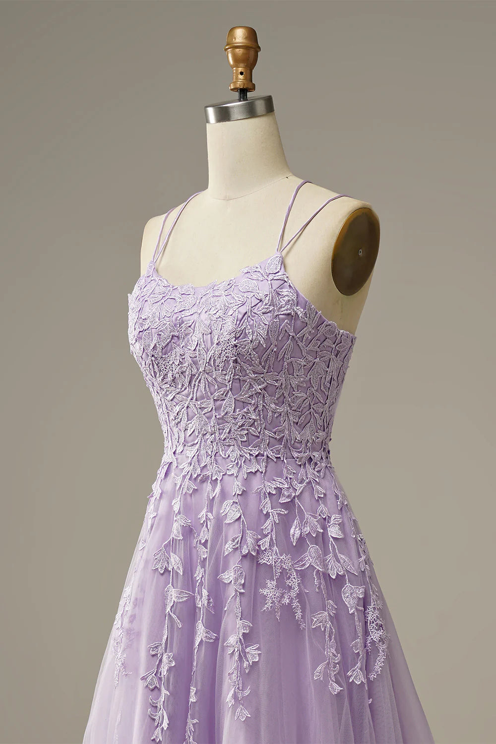 Full length view of a model in a purple A-Line floral prom dress.
