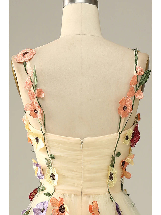 Full view of the A-line floral tulle dress, perfect for a wedding guest.