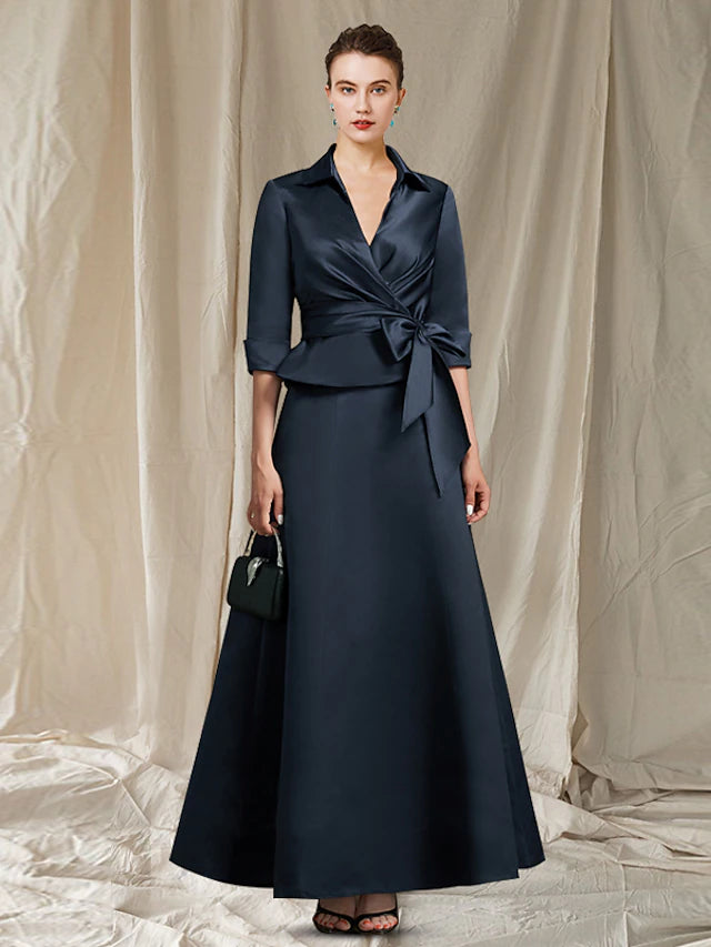 Elegant A-Line Mother of the Bride dress with V-neck and half sleeves.