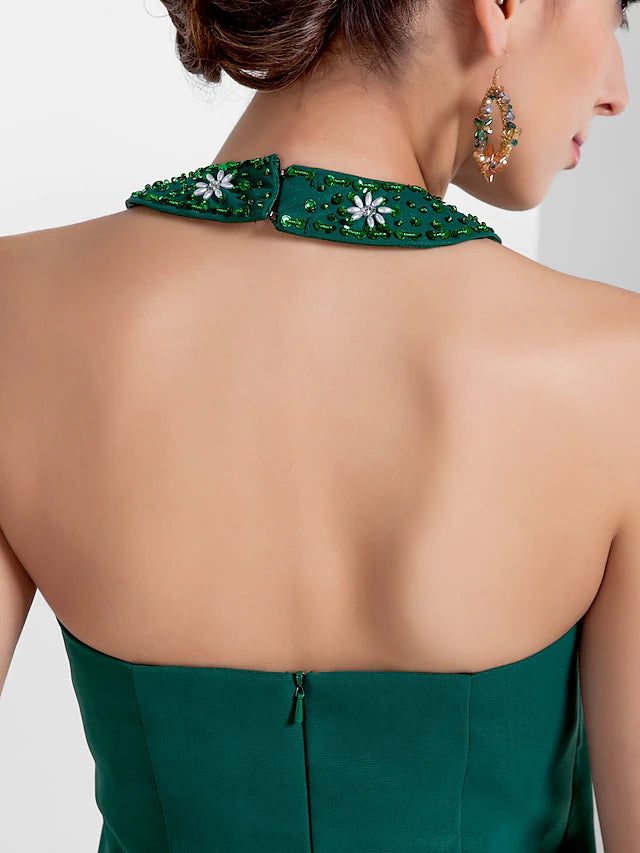Full length view of the dress, showcasing its elegant drape.