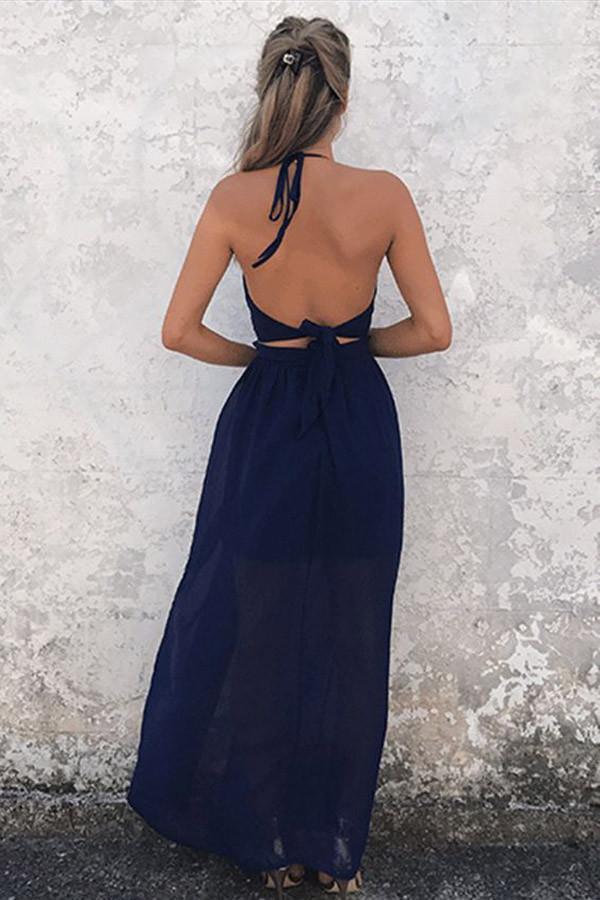 Back view of the navy blue chiffon formal gown, highlighting the backless design.