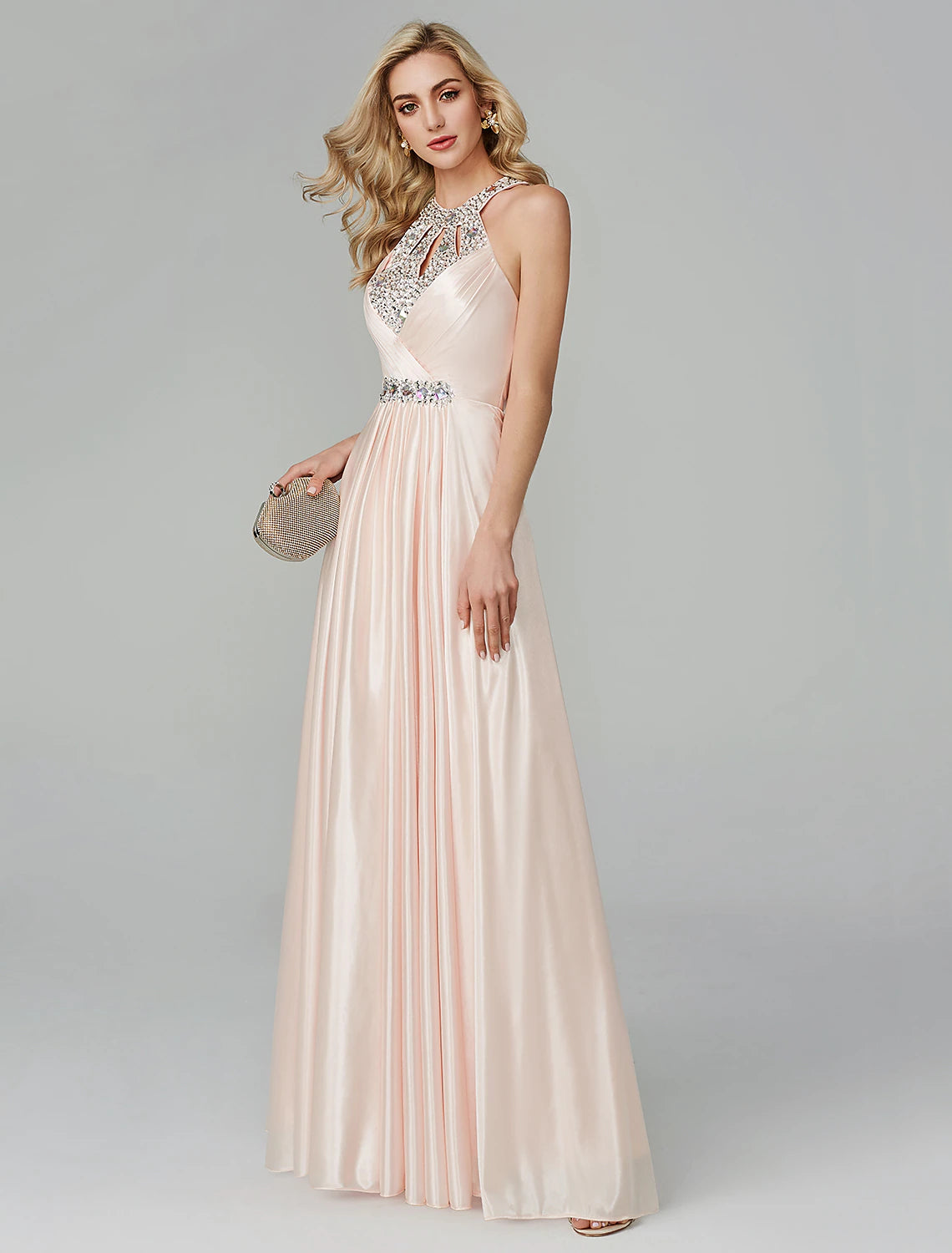 A-line black dress with shimmering sequins, shown in motion.