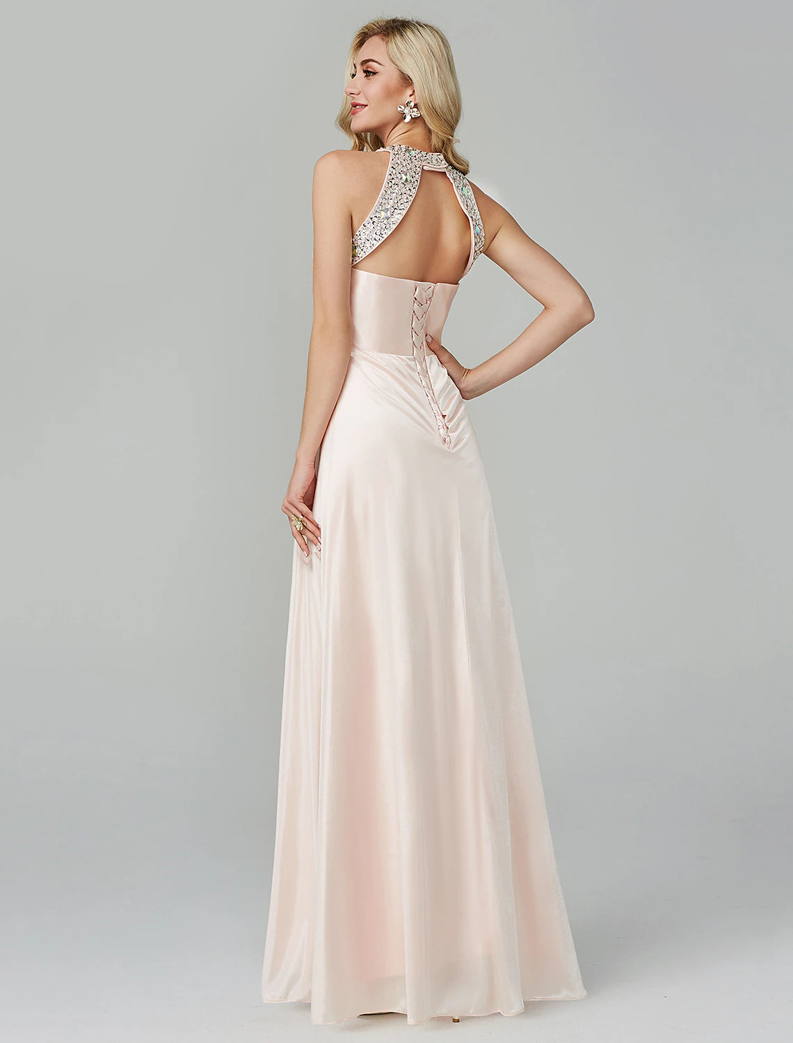 Elegant black floor-length dress, suitable for formal occasions.