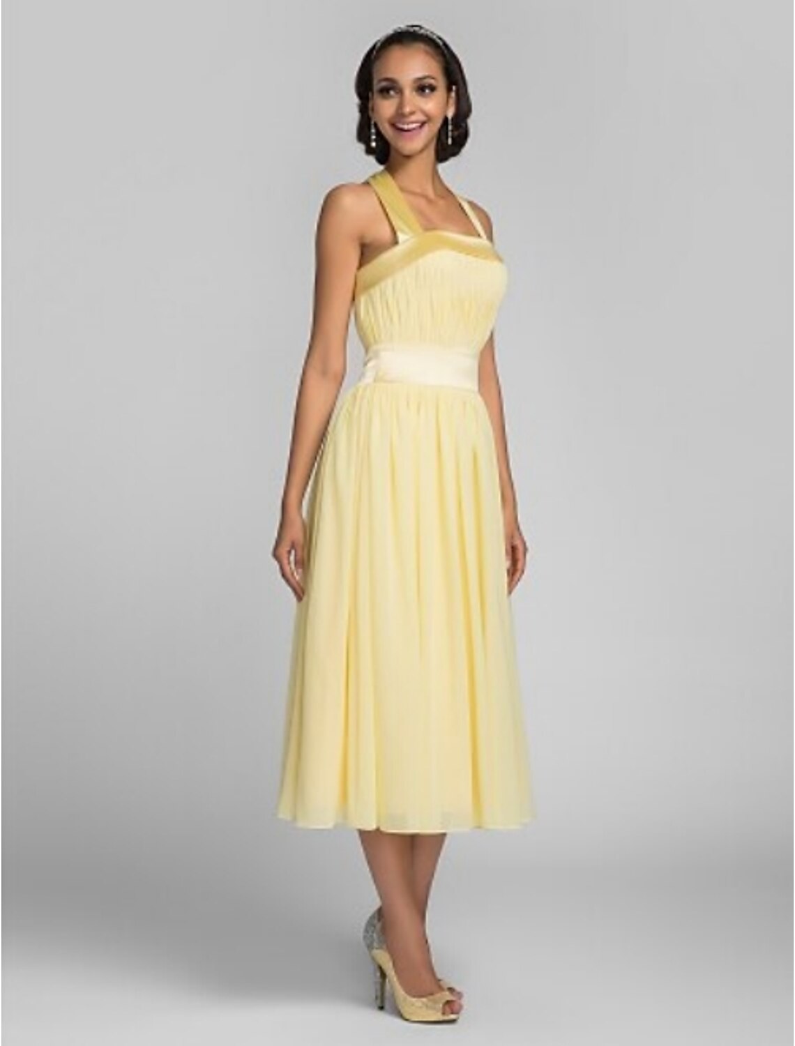 Detail of the fabric texture and draping on the A-line dress.