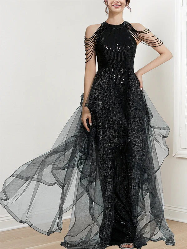 Back view of a model in an A-line halter long prom dress, showcasing the flowing skirt.