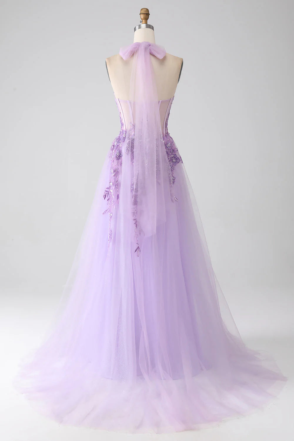 Side view of the A-Line halter neck beaded long prom dress.