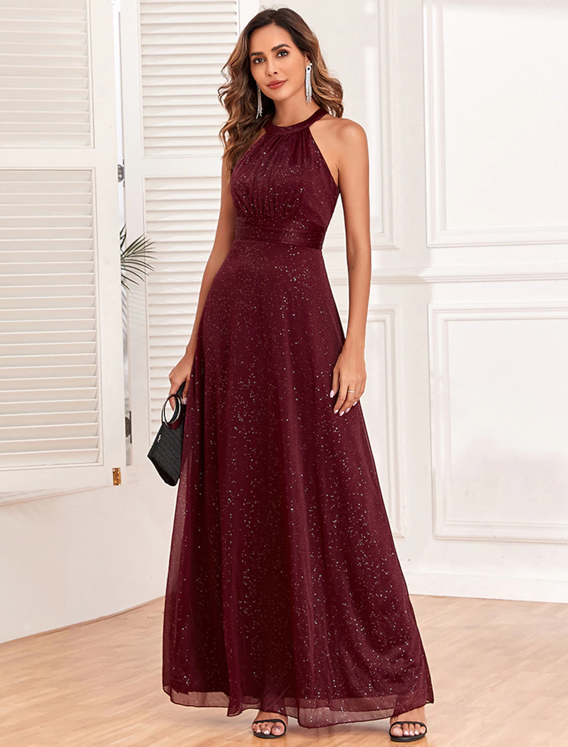 Elegant A-Line halter neck glitter evening gown, front view.