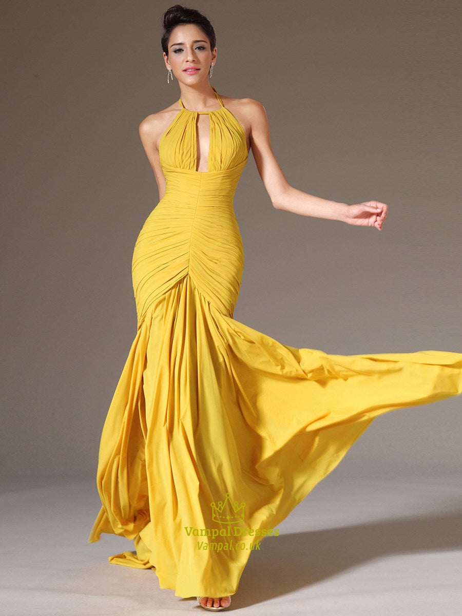 Back view of the yellow A-line halter neck prom dress.