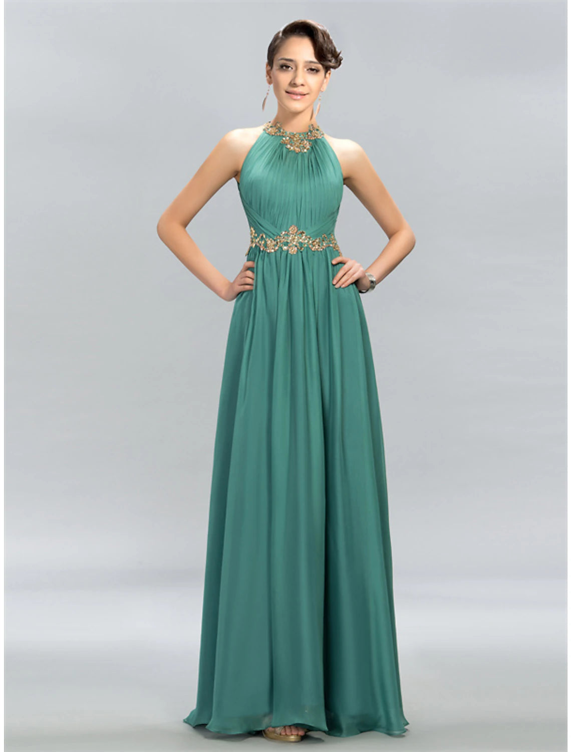 Full length view of the sleeveless party dress.