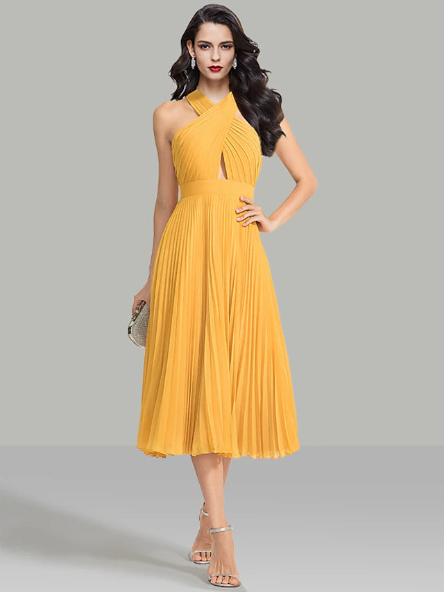 Elegant A-line halter chiffon tea length dress with ruched details.