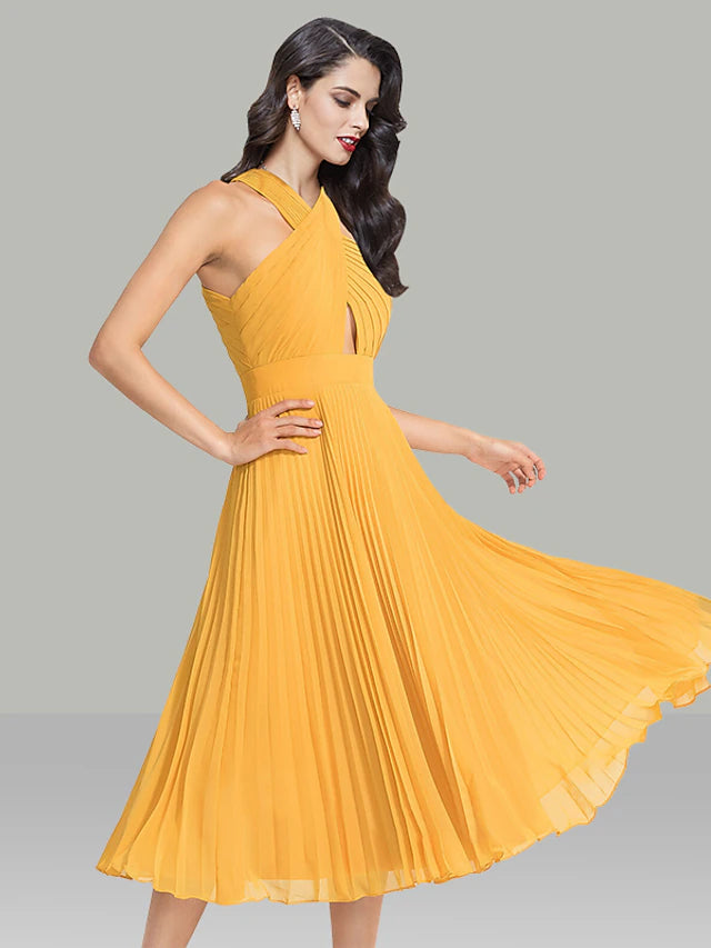 Back view of A-line halter chiffon dress showing tea length.