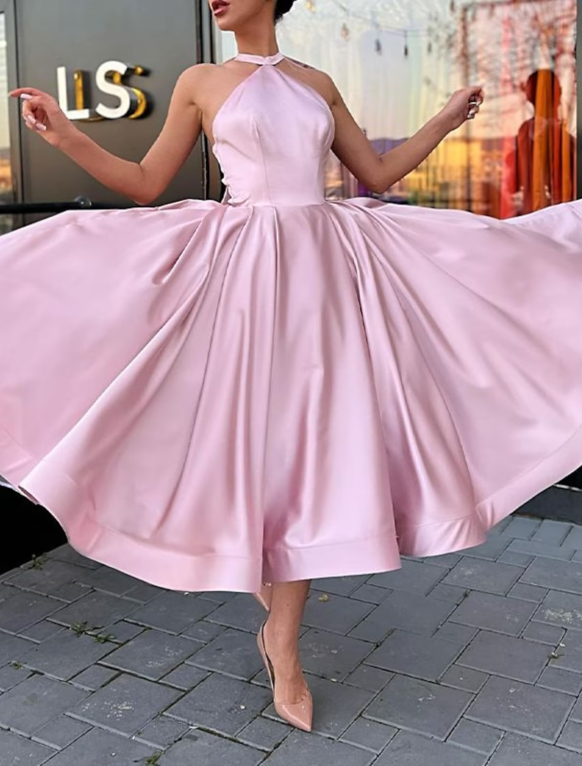 Back view of the A-line halter satin plus size dress, showcasing its ankle length.