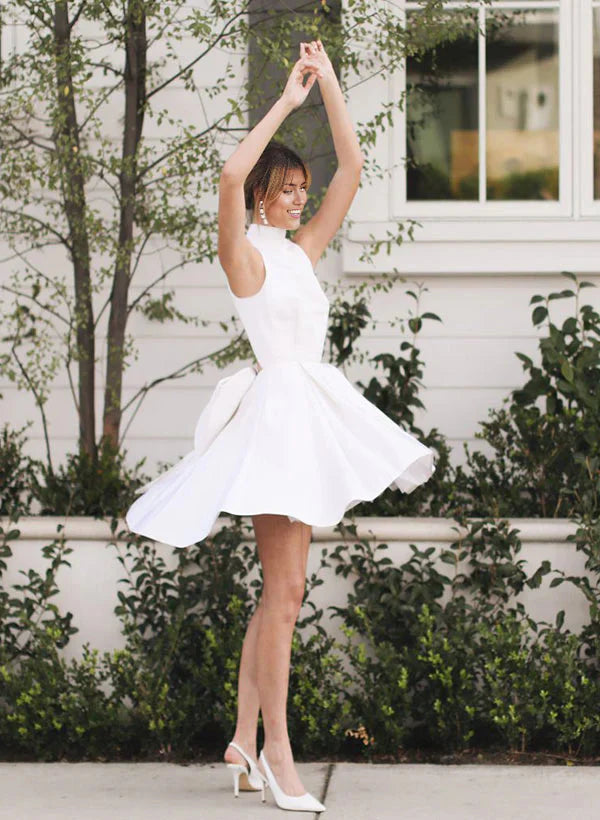 Back view of the A-Line halter satin wedding dress, featuring the halter neckline and bow.