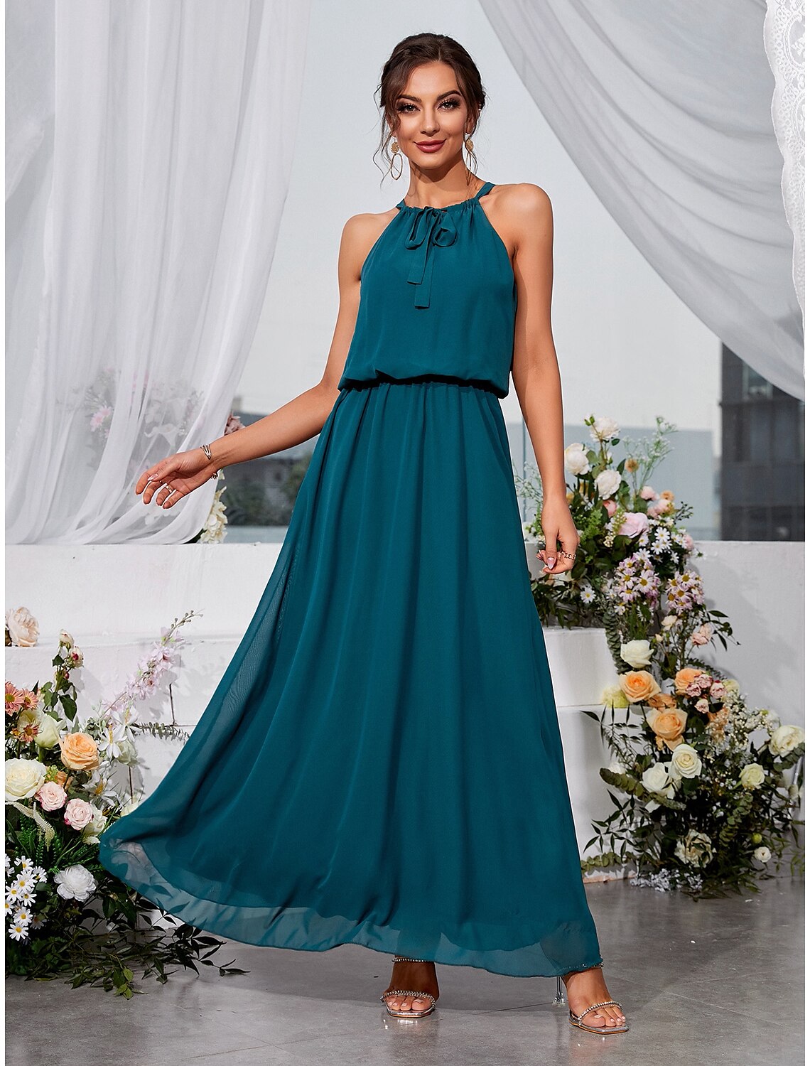 Elegant A-line halter lace dress, front view.