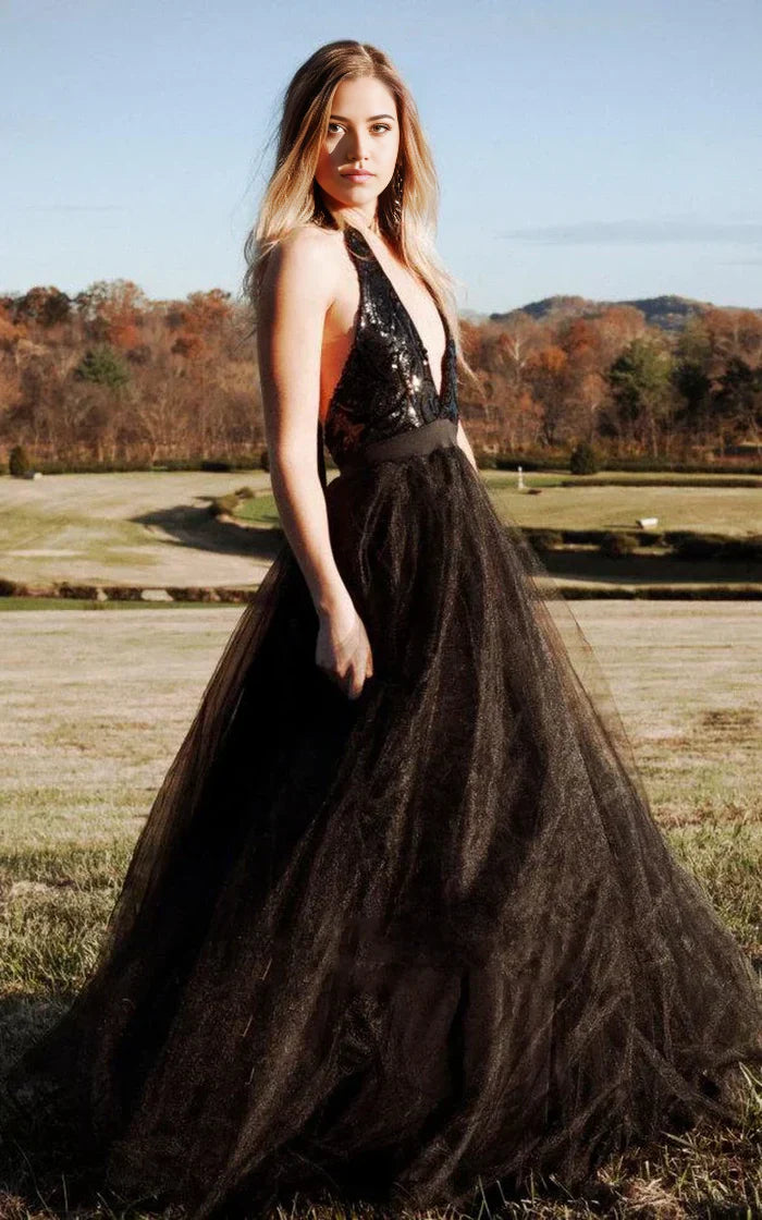 Side view of a sleeveless tulle wedding gown with sparkling sequins.