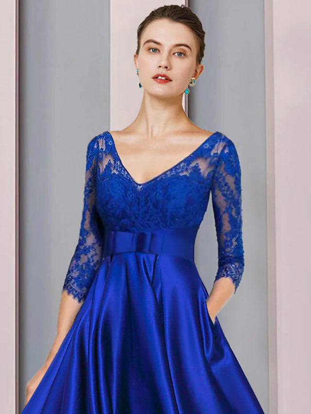 Elegant A-Line high-low tea length dress with 3/4 sleeves, back view.