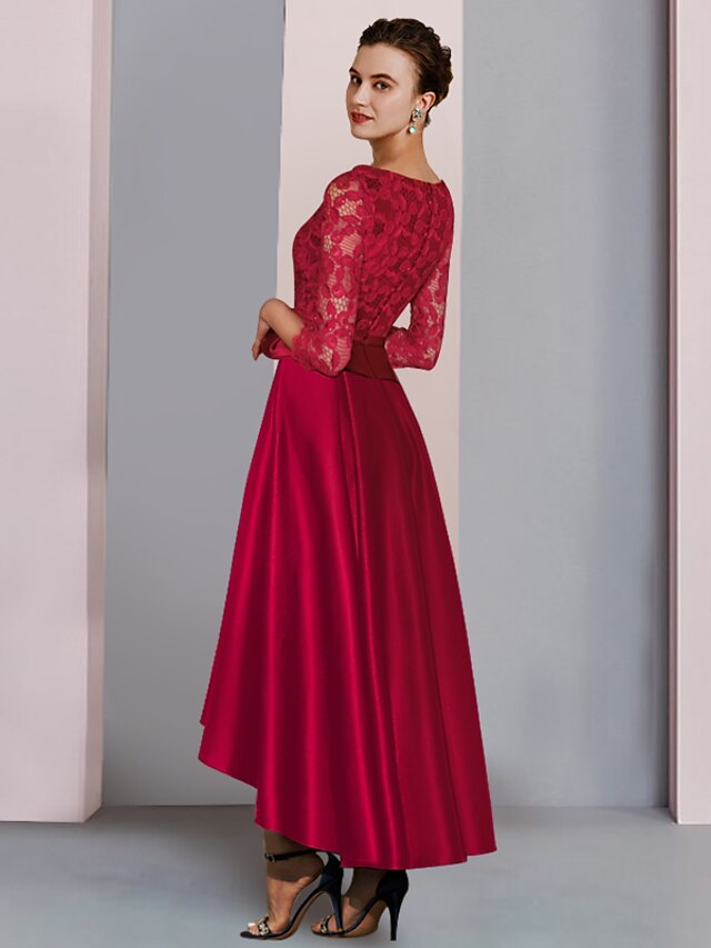 Back view of the A-Line Mother of the Bride dress showing pleats and bow detail.