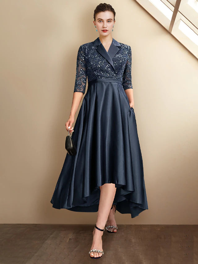 Plus size woman wearing an elegant A-line high-low tea length mother of the bride dress with half sleeves and a shirt collar.