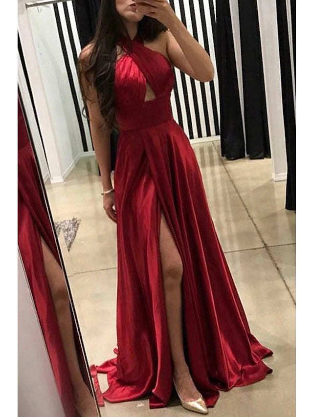 Side view of a formal A-line gown with a court train.