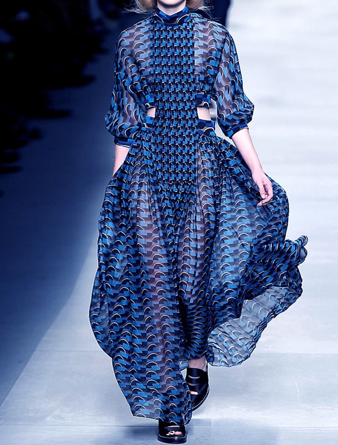 Back view of the high neck long sleeve printed chiffon dress.