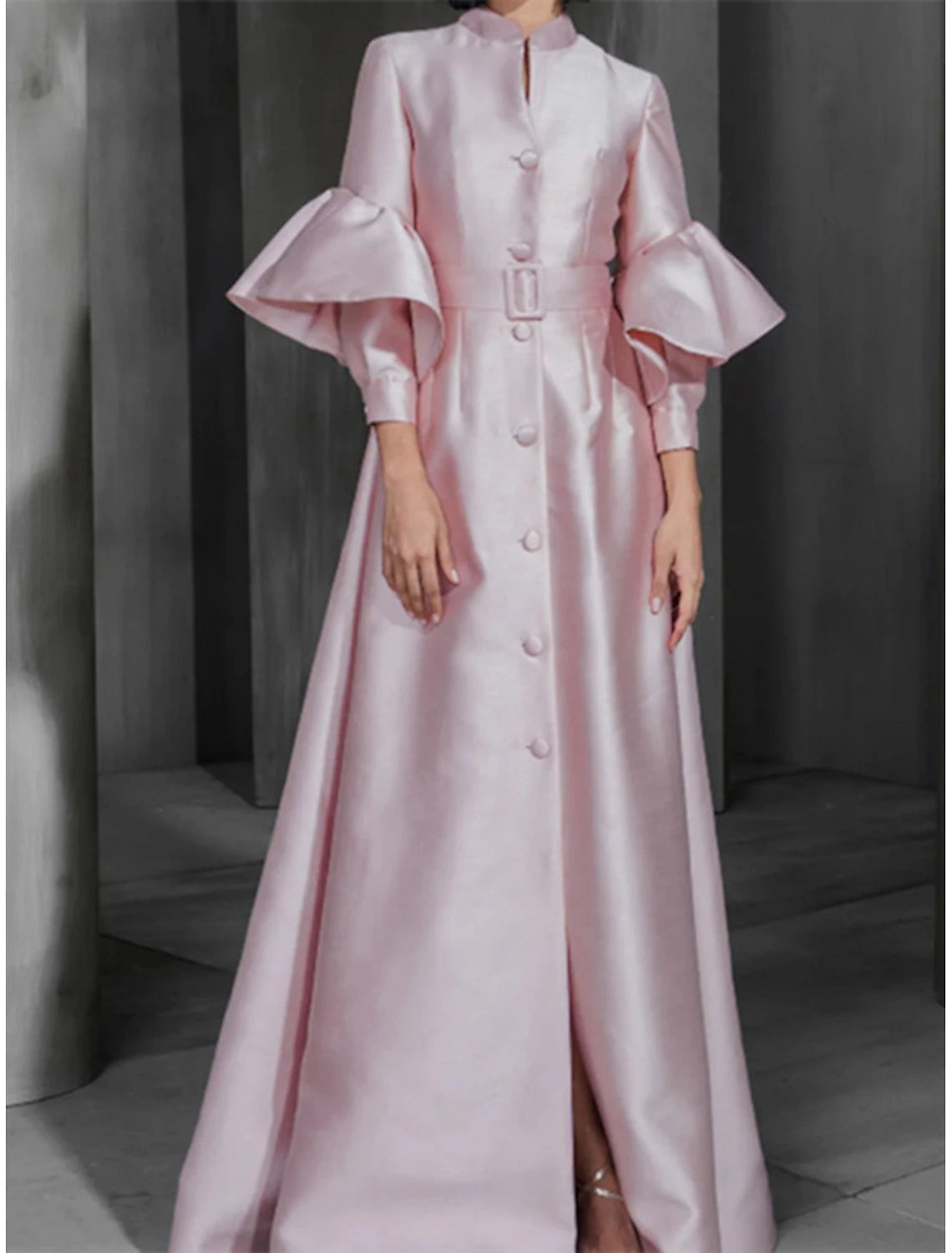 Elegant A-Line satin prom gown with long sleeves and high neck.