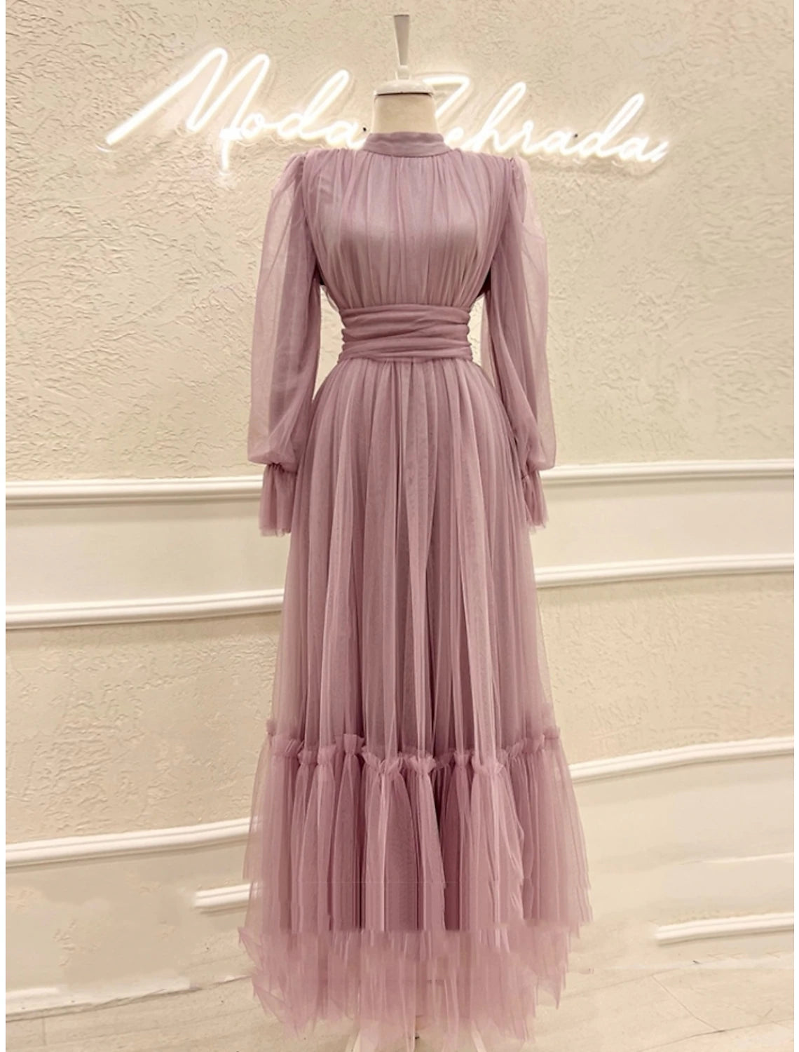 Close-up of the pleated and ruched tulle fabric.