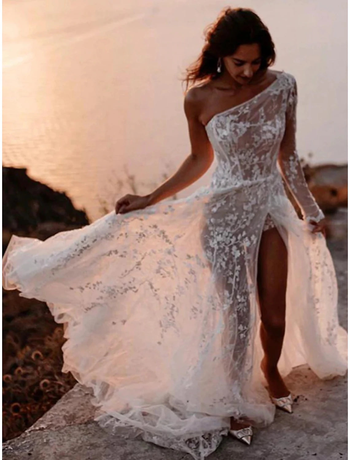 Side view of a white A-Line high neck tea length reception dress.