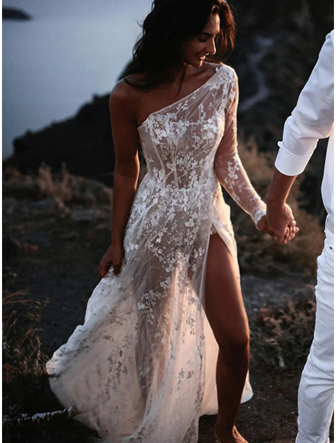 Full length view of the elegant tea length bridal gown.