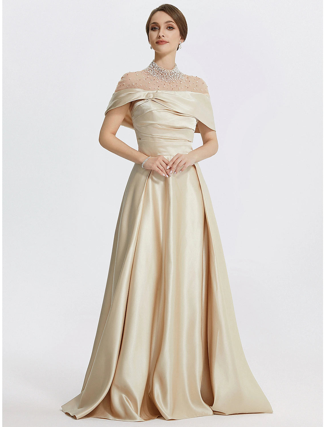 Model wearing an elegant A-line high neck evening gown with ruched details and pearl embellishments.