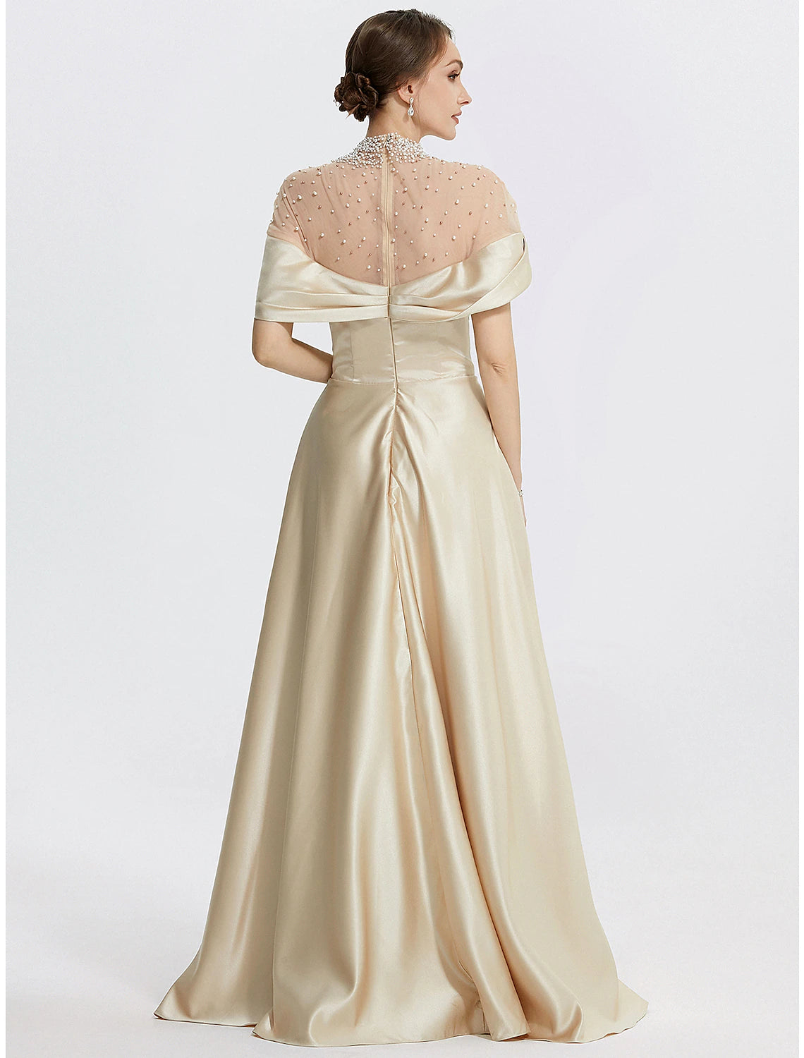 Model posing in the sleeveless Italy satin evening gown, full length.