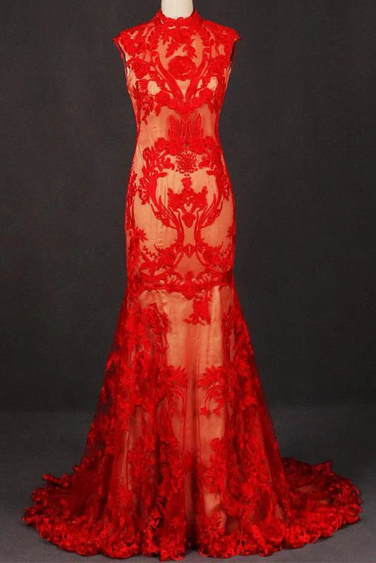 Woman wearing an elegant high neck sleeveless lace tulle prom dress.