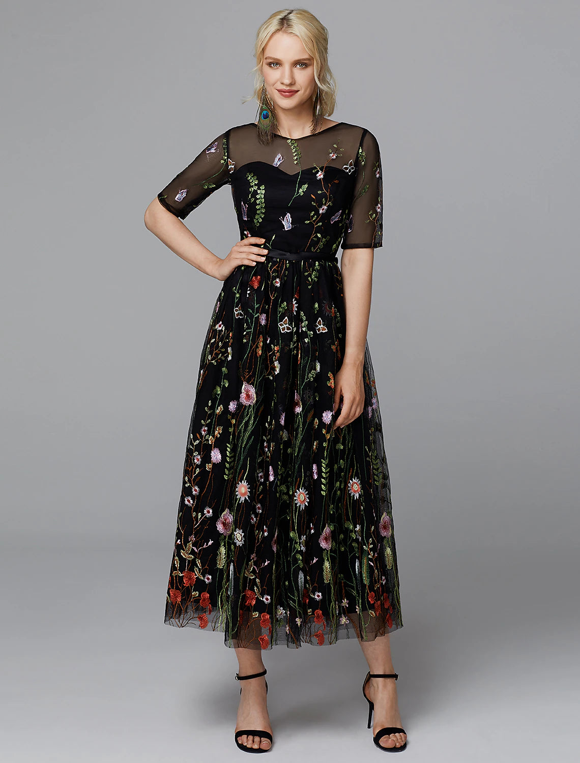 Back view of A-Line floral lace tea length dress with embroidery appliques.